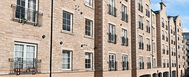 Modern flats with arches for parking underneath